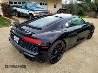 2021 Audi R8 z VIN WUAKBAFX4M7901384, wystawiony jako Copart lot #81273994 z przebiegiem 5665 mil mil oraz Tytuł czysty. Historia ofert i sprzedaży dostępna na DreamBid. Obrazek 4.