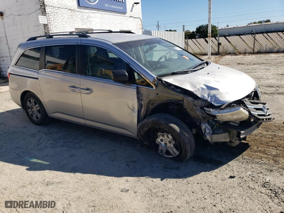 2011 Honda Odyssey LX with VIN 5FNRL5H29BB069775, listed as a Copart auction lot 75111944 with 169,225 mi miles and Salvage Title. Bid and sale history available at carsss.com. Image 4.