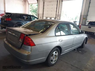 2003 Honda Civic Hybrid with VIN JHMES95613S031198, listed as a IAAI auction lot 40508590 with 276,815 mi miles. Bid and sale history available at carsss.com. Image 4.