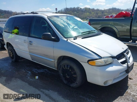 1999 Dodge Caravan z VIN 1B4GP45G2XB554868, wystawiony jako IAAI lot #41882038 z przebiegiem 130 743 mil mil oraz . Historia ofert i sprzedaży dostępna na DreamBid. Obrazek 1.