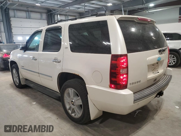 2010 Chevrolet Tahoe LTZ with VIN 1GNUKCE02AR274147, listed as a Copart auction lot 54667545 with 210,207 mi miles and Salvage title. Bid and sale history available at DreamBid. Image 2.