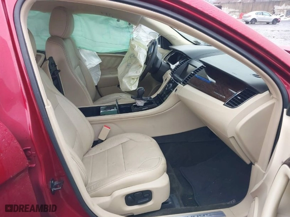 2015 Ford Taurus Limited with VIN 1FAHP2J89FG110114, listed as a IAAI auction lot 41568641 with 153,579 mi miles. Bid and sale history available at carsss.com. Image 5.