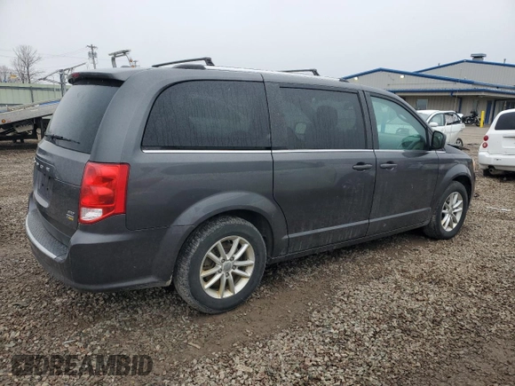 2019 Dodge Grand Caravan SXT with VIN 2C4RDGCGXKR518476, listed as a Copart auction lot 52341455 with 59,102 mi miles and Salvage Title. Bid and sale history available at DreamBid. Image 3.