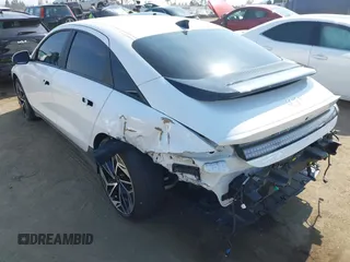 2023 Hyundai Ioniq 6 SEL z VIN KMHM34AA0PA028579, wystawiony jako IAAI lot #42171621 z przebiegiem 24 606 mil mil oraz . Historia ofert i sprzedaży dostępna na DreamBid. Obrazek 3.
