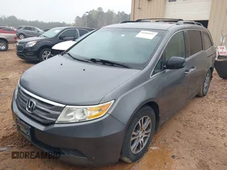 2011 Honda Odyssey EX-L with VIN 5FNRL5H66BB103352, listed as a IAAI auction lot 41901832 with 238,727 mi miles and . Bid and sale history available at carsss.com. Image 18.