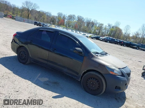 2009 Toyota Yaris with VIN JTDBT903294057773, listed as a IAAI auction lot 42071027 with 164,128 mi miles. Bid and sale history available at carsss.com. Image 1.
