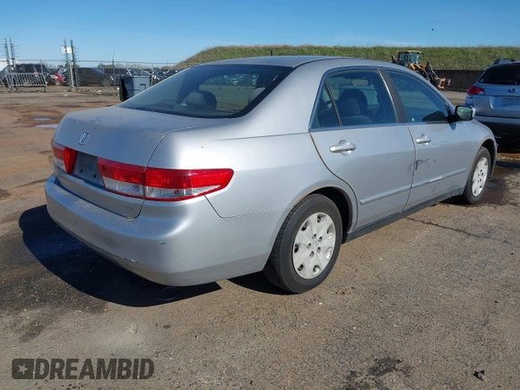 2003 Honda Accord LX with VIN JHMCM56303C043710, listed as a IAAI auction lot 41517509 with 283,083 mi miles and . Bid and sale history available at DreamBid. Image 4.