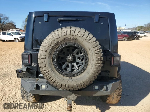 2014 Jeep Wrangler Unlimited Rubicon X with VIN 1C4HJWFG8EL119654, listed as a Copart auction lot 46699055 with 148,412 mi miles and Salvage title. Bid and sale history available at DreamBid. Image 6.