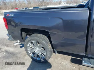 2014 Chevrolet Silverado 1500 LT with VIN 1GCVKREC0EZ377177, listed as a IAAI auction lot 41683600 with 148,672 mi miles and . Bid and sale history available at DreamBid. Image 18.