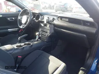 2018 Ford Mustang EcoBoost z VIN 1FA6P8TH0J5172447, wystawiony jako IAAI lot #41657679 z przebiegiem 21 422 mil mil oraz . Historia ofert i sprzedaży dostępna na DreamBid. Obrazek 5.