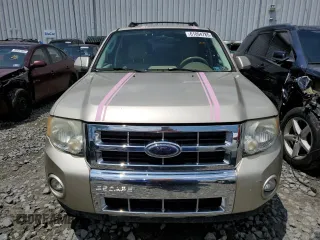 2010 Ford Escape Limited with VIN 1FMCU0EGXAKA03092, listed as a Copart auction lot 61094785 with 114,884 mi miles and Salvage title. Bid and sale history available at DreamBid. Image 5.
