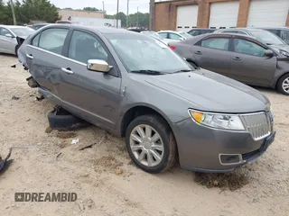 2012 Lincoln MKZ with VIN 3LNHL2JC0CR800294, listed as a IAAI auction lot 42423361 with 101,579 mi miles and . Bid and sale history available at DreamBid. Image 1.