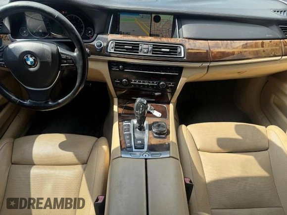 2015 BMW 7 Series 750i xDrive with VIN WBAYB6C5XFD965910, listed as a Copart auction lot 55407895 with 173,486 mi miles and Salvage Title. Bid and sale history available at carsss.com. Image 8.