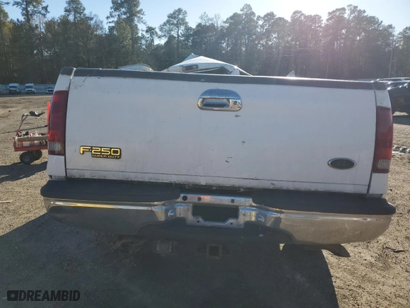2000 Ford Super Duty F-250 XL with VIN 1FTNX20S2YEE37396, listed as a Copart auction lot 88545865 with 204,769 mi miles and Salvage Title. Bid and sale history available at carsss.com. Image 6.