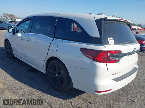 2023 Honda Odyssey Sport z VIN 5FNRL6H77PB011088, wystawiony jako IAAI lot #41883596 z przebiegiem 80 528 mil mil oraz . Historia ofert i sprzedaży dostępna na DreamBid. Obrazek 3.