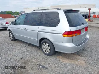 2004 Honda Odyssey EX-L z VIN 5FNRL189X4B013837, wystawiony jako IAAI lot #42215471 z przebiegiem 208 729 mil mil oraz . Historia ofert i sprzedaży dostępna na DreamBid. Obrazek 3.