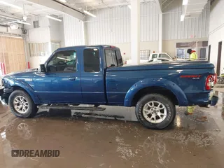 2011 Ford Ranger XLT with VIN 1FTLR4FE3BPA52049, listed as a IAAI auction lot 41394422 with 112,080 mi miles. Bid and sale history available at carsss.com. Image 14.