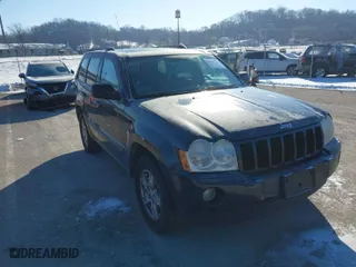 2007 Jeep Grand Cherokee Laredo with VIN 1J8GS48K97C538509, listed as a IAAI auction lot 41605236 with 164,530 mi miles. Bid and sale history available at carsss.com. Image 1.