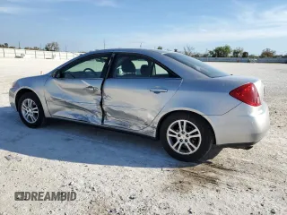2005 Pontiac G6 with VIN 1G2ZG528154129534, listed as a Copart auction lot 44682694 with 74,338 mi miles and Salvage Title. Bid and sale history available at carsss.com. Image 2.