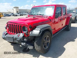 2023 Jeep Gladiator Rubicon z VIN 1C6JJTBG2PL509200, wystawiony jako IAAI lot #42537312 z przebiegiem Nie podano mil oraz . Historia ofert i sprzedaży dostępna na DreamBid. Obrazek 16.