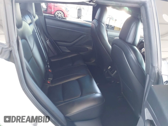 2020 Tesla Model 3 Standard Range Plus with VIN 5YJ3E1EA4LF799650, listed as a IAAI auction lot 41817538 with 54,835 mi miles. Bid and sale history available at carsss.com. Image 8.