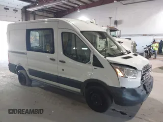 2016 Ford Transit Cargo z VIN 1FTYR1CM8GKA27958, wystawiony jako IAAI lot #40308535 z przebiegiem 106 352 mil mil oraz . Historia ofert i sprzedaży dostępna na DreamBid. Obrazek 1.
