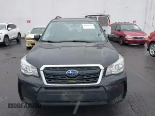 2018 Subaru Forester Premium with VIN JF2SJGEC4JH581718, listed as a IAAI auction lot 41988454 with 76,376 mi miles. Bid and sale history available at carsss.com. Image 6.