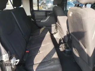 2018 Jeep Wrangler JK Unlimited Sport S with VIN 1C4BJWDG1JL907310, listed as a Copart auction lot 70826504 with 135,413 mi miles and Salvage Title. Bid and sale history available at carsss.com. Image 11.