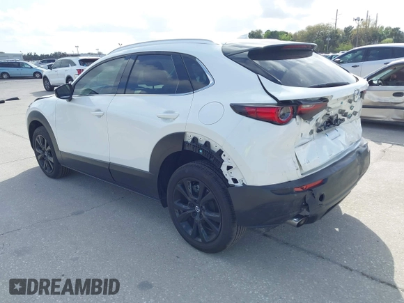 2022 Mazda CX-30 2.5 Turbo Premium Package with VIN 3MVDMBDY3NM437897, listed as a IAAI auction lot 41715776 with 42,771 mi miles. Bid and sale history available at carsss.com. Image 3.
