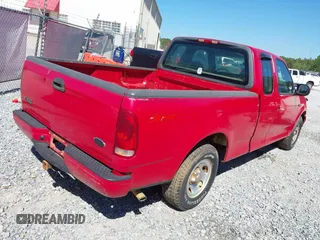 2000 Ford F-150 XL with VIN 1FTZX1720YNB27491, listed as a IAAI auction lot 41469775 with 108,243 mi miles. Bid and sale history available at carsss.com. Image 4.
