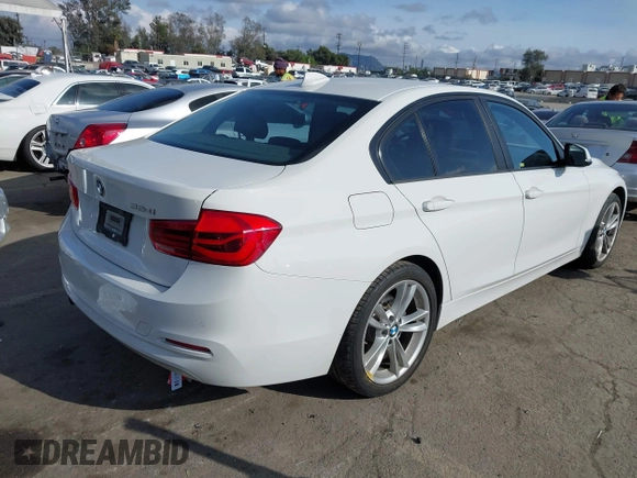2018 BMW 3 Series 320i with VIN WBA8A9C54JAH12017, listed as a IAAI auction lot 41921292 with 49,267 mi miles. Bid and sale history available at carsss.com. Image 4.
