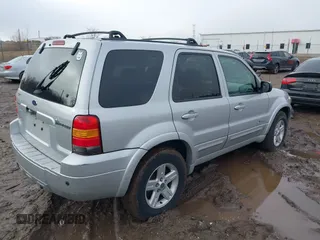 2006 Ford Escape Hybrid with VIN 1FMCU96H16KB20756, listed as a IAAI auction lot 41223286 with 101,829 mi miles and . Bid and sale history available at DreamBid. Image 4.