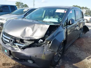 2015 Honda Odyssey Touring Elite with VIN 5FNRL5H90FB097984, listed as a IAAI auction lot 41822726 with 107,322 mi miles. Bid and sale history available at carsss.com. Image 6.