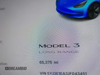 2018 Tesla Model 3 Long Range Battery z VIN 5YJ3E1EA3JF043451, wystawiony jako IAAI lot #41529214 z przebiegiem 65 375 mil mil oraz . Historia ofert i sprzedaży dostępna na DreamBid. Obrazek 16.