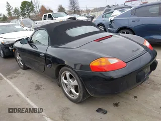 2002 Porsche Boxster z VIN WP0CA298X2U623474, wystawiony jako IAAI lot #41754154 z przebiegiem 98 896 mil mil oraz . Historia ofert i sprzedaży dostępna na DreamBid. Obrazek 3.