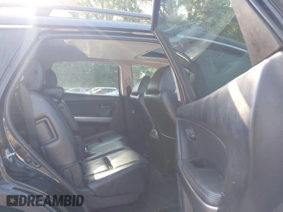 2012 Mazda CX-9 Grand Touring z VIN JM3TB2DA7C0333345, wystawiony jako IAAI lot #42224023 z przebiegiem 177 289 mil mil oraz . Historia ofert i sprzedaży dostępna na DreamBid. Obrazek 8.