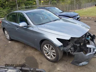 2015 Infiniti Q50 z VIN JN1BV7AR9FM418836, wystawiony jako IAAI lot #42181355 z przebiegiem 165 787 mil mil oraz . Historia ofert i sprzedaży dostępna na DreamBid. Obrazek 1.