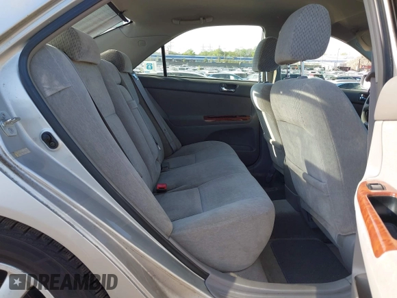 2003 Toyota Camry LE with VIN 4T1BE30K43U227357, listed as a IAAI auction lot 42144237 with 101,135 mi miles and . Bid and sale history available at DreamBid. Image 8.