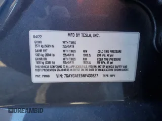 2022 Tesla Model Y Long Range z VIN 7SAYGAEE5NF430627, wystawiony jako Copart lot #89192355 z przebiegiem 35 107 mil mil oraz Szkody całkowita. Historia ofert i sprzedaży dostępna na DreamBid. Obrazek 13.