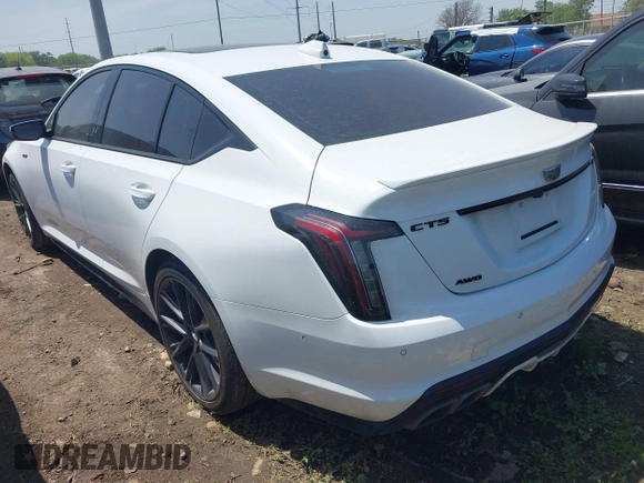 2021 Cadillac CT5 V-Series with VIN 1G6DV5RW2M0128157, listed as a IAAI auction lot 41928263 with 49,698 mi miles and . Bid and sale history available at DreamBid. Image 3.