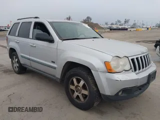 2008 Jeep Grand Cherokee Laredo with VIN 1J8GS48K68C170789, listed as a IAAI auction lot 42032277 with 292,837 mi miles. Bid and sale history available at carsss.com. Image 1.