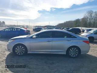 2014 Hyundai Sonata SE with VIN 5NPEC4ACXEH923397, listed as a IAAI auction lot 41748671 with 182,136 mi miles and . Bid and sale history available at DreamBid. Image 14.