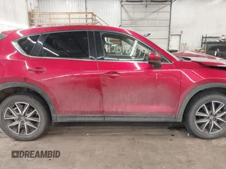 2018 Mazda CX-5 Grand Touring with VIN JM3KFBDM5J0414013, listed as a IAAI auction lot 42013479 with 88,225 mi miles and . Bid and sale history available at DreamBid. Image 14.