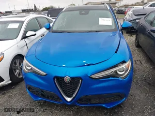 2021 Alfa Romeo Stelvio Ti with VIN ZASPAKBN0M7D18611, listed as a IAAI auction lot 41104626 with 30,188 mi miles. Bid and sale history available at carsss.com. Image 12.