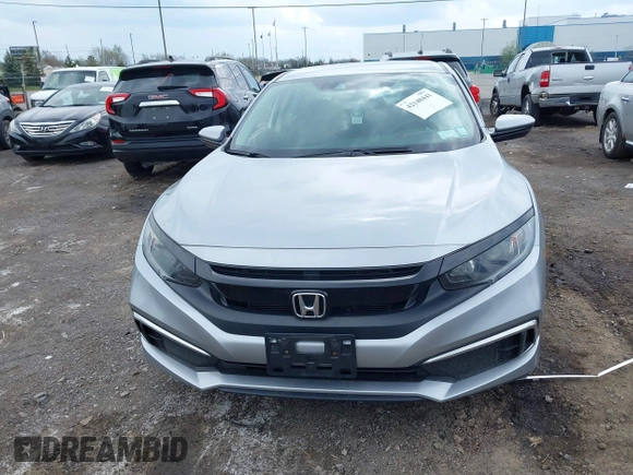 2020 Honda Civic LX with VIN 2HGFC2F65LH544133, listed as a IAAI auction lot 42148441 with 49,063 mi miles and . Bid and sale history available at DreamBid. Image 12.