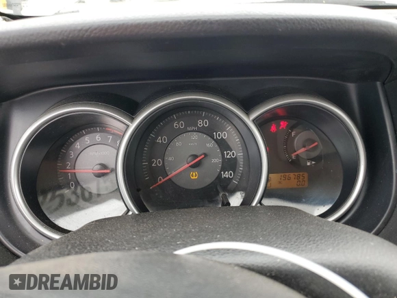 2009 Nissan Versa S with VIN 3N1BC11E79L433933, listed as a Copart auction lot 54953675 with 196,785 mi miles and Salvage Title. Bid and sale history available at DreamBid. Image 9.