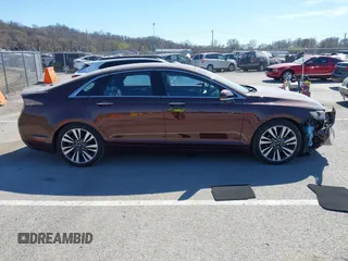 2019 Lincoln MKZ Reserve II z VIN 3LN6L5E99KR623668, wystawiony jako IAAI lot #41822730 z przebiegiem 13 609 mil mil oraz . Historia ofert i sprzedaży dostępna na DreamBid. Obrazek 13.