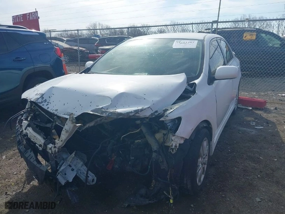 2010 Toyota Corolla with VIN 1NXBU4EE9AZ169867, listed as a IAAI auction lot 41791482 with 184,417 mi miles. Bid and sale history available at carsss.com. Image 2.