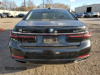 2020 BMW 7 Series 740i xDrive with VIN WBA7T4C04LCD18344, listed as a Copart auction lot 82823384 with Not provided miles and Salvage title. Bid and sale history available at DreamBid. Image 6.