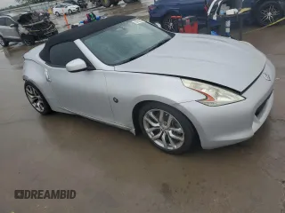 2012 Nissan 370Z Touring z VIN JN1AZ4FH5CM371038, wystawiony jako Copart lot #50289285 z przebiegiem 52 508 mil mil oraz Szkody całkowita. Historia ofert i sprzedaży dostępna na DreamBid. Obrazek 4.